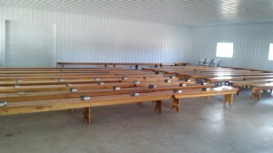The Eichers set up benches for church services in their new pole barn.